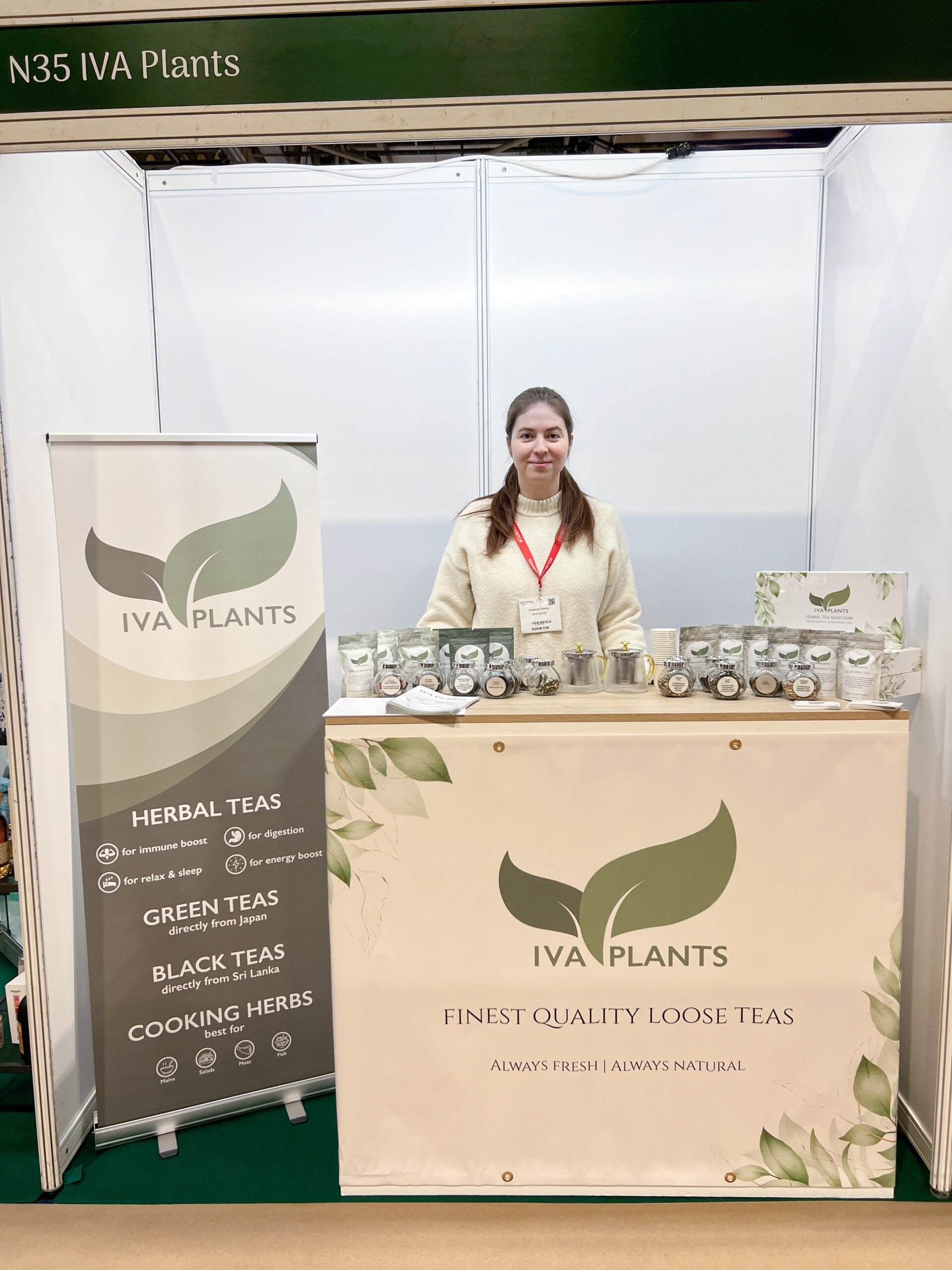 Alexandra Ghemu, founder of IVA Plants, at Scotland’s Trade Show 2025 with herbal tea stand